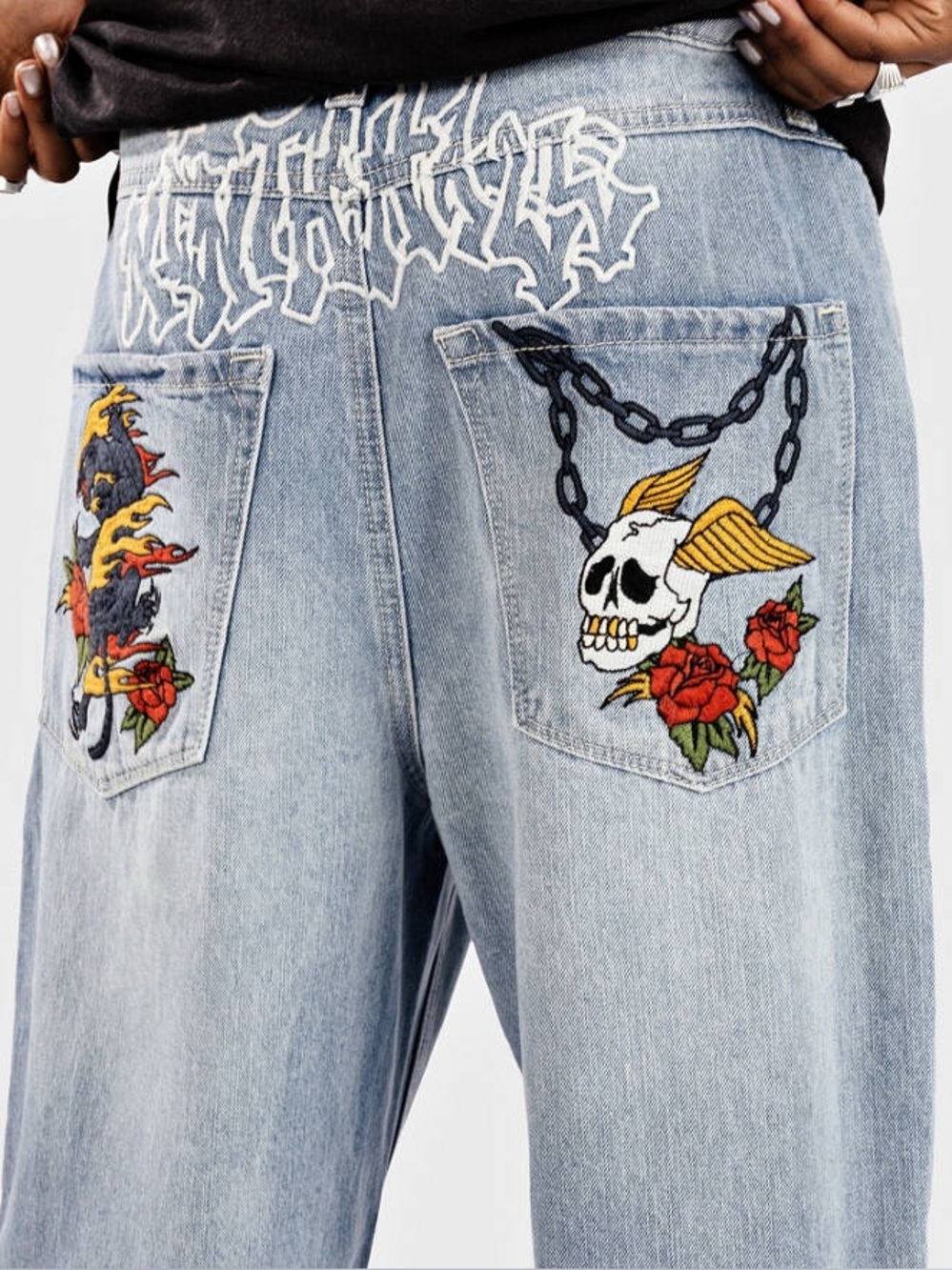 Ninth hall ambush I
Embroidered Light Blue  Jeans with Skull & Rose Patcheswith